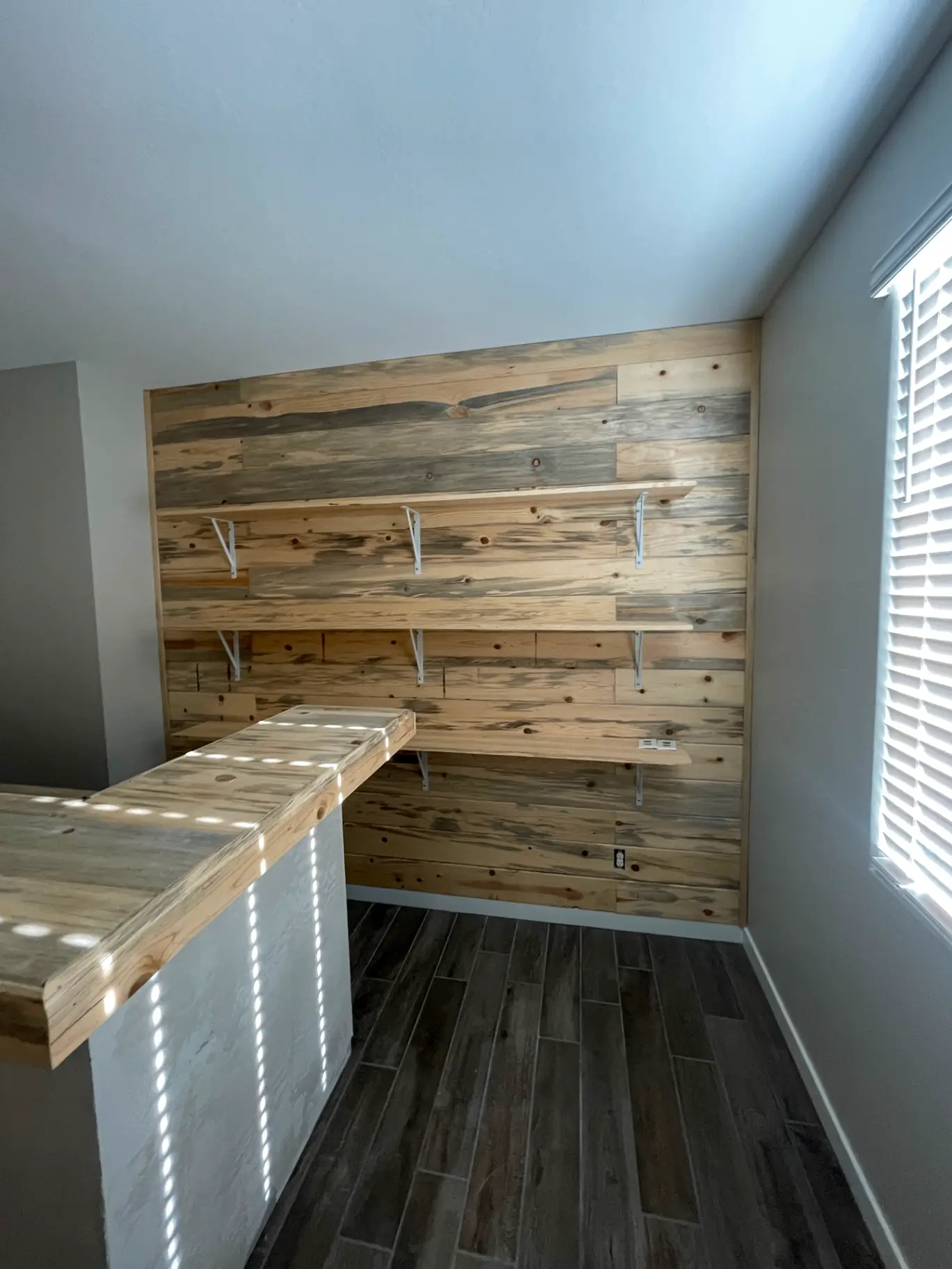 Built in shelving in a Phoenix home painted to match the trim for a seamless custom look