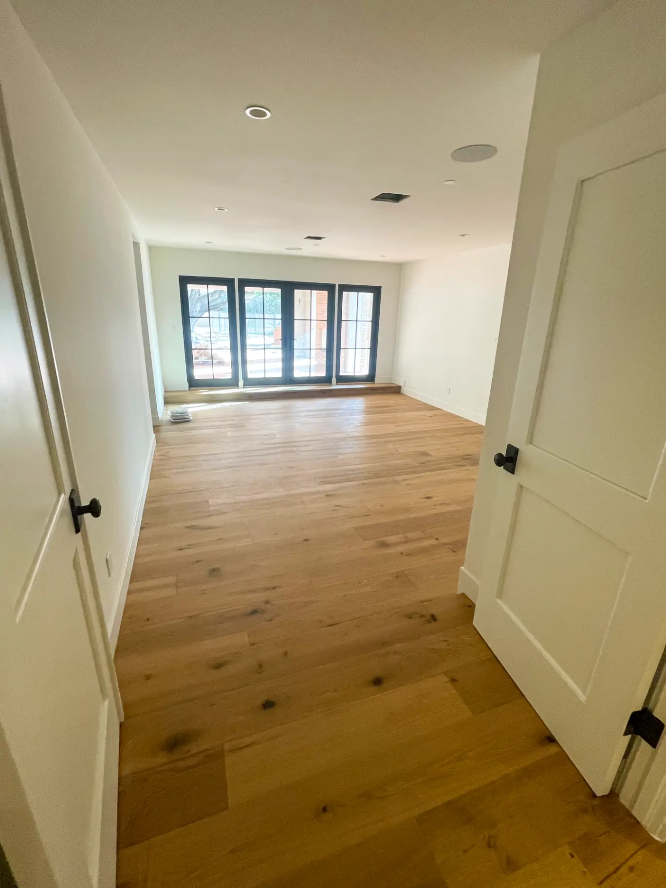 Scottsdale master suite painted in a calm low sheen neutral for a restful bedroom that hides small scuffs